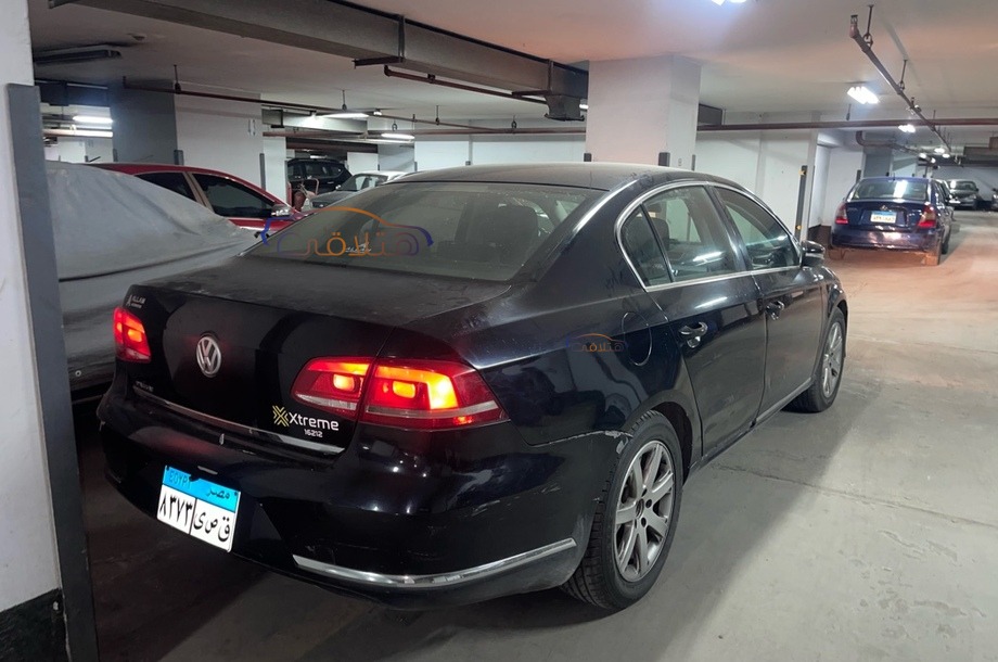 Passat Volkswagen أسود