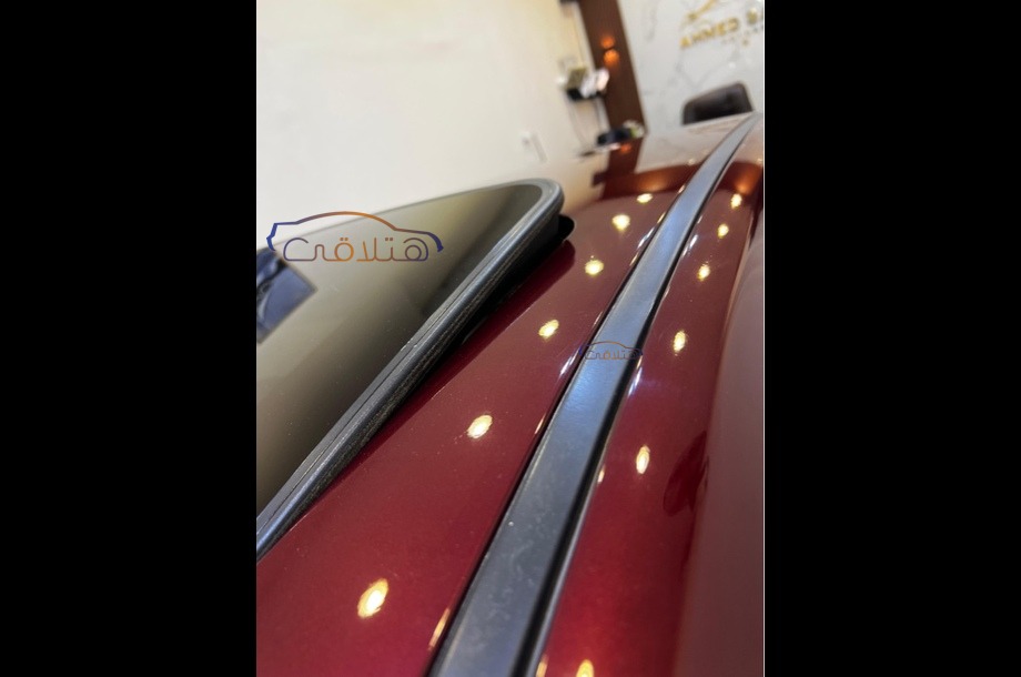 Optra Chevrolet احمر غامق