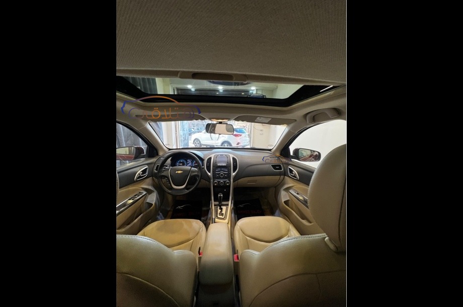 Optra Chevrolet احمر غامق