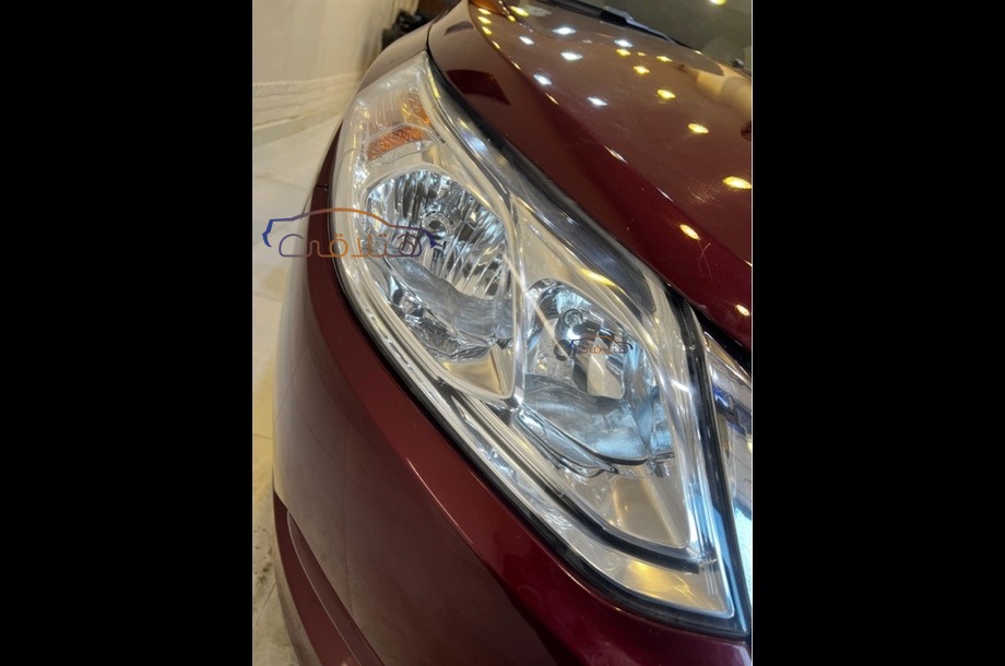 Optra Chevrolet احمر غامق