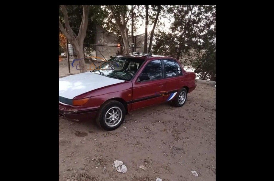 Lancer Mitsubishi احمر