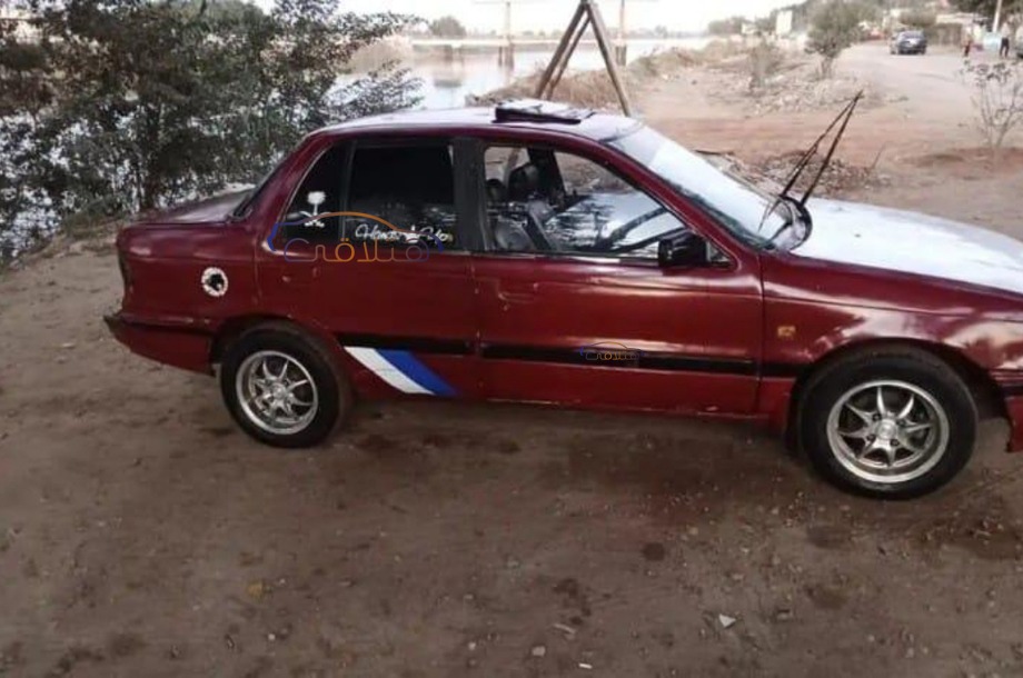 Lancer Mitsubishi احمر