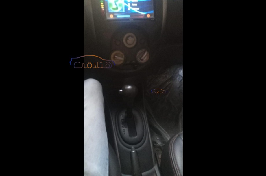 Sunny Nissan Dark red