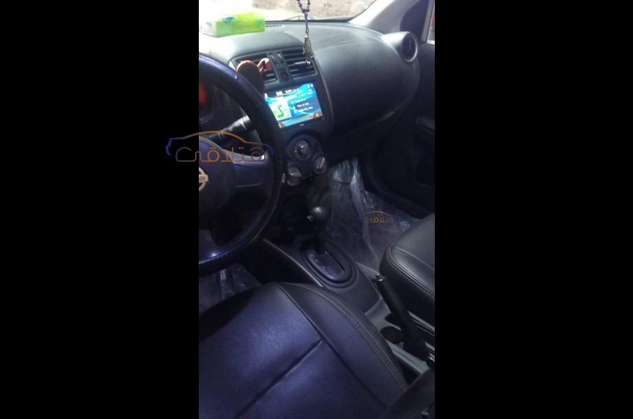 Sunny Nissan Dark red