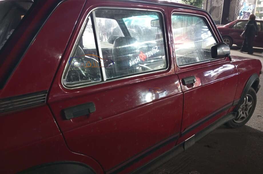 128 Fiat احمر