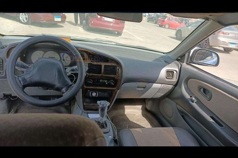 Wira Proton أزرق