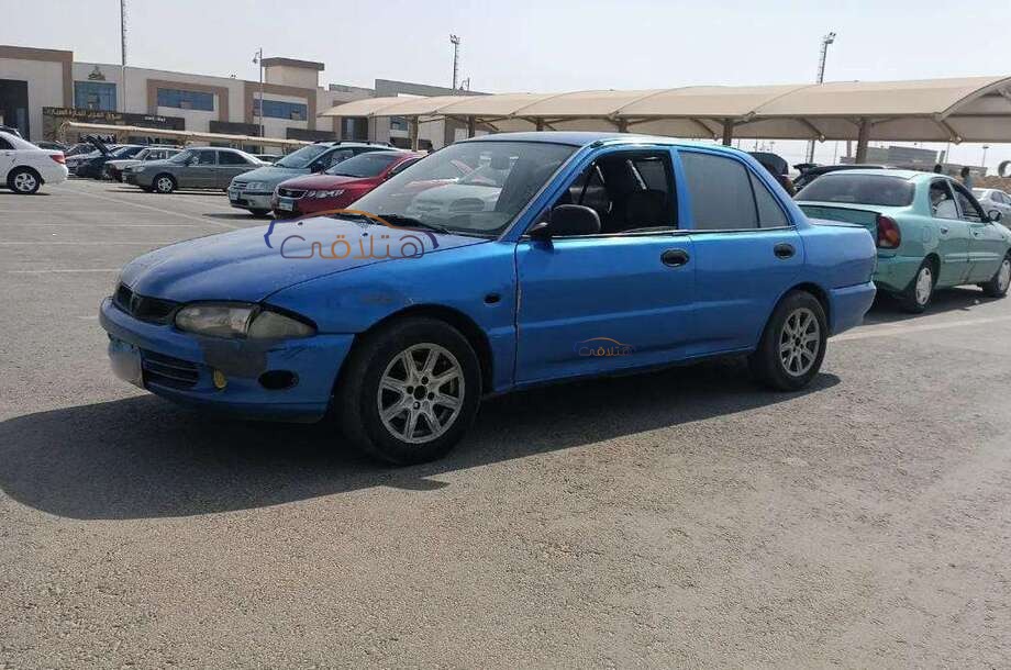 Wira Proton أزرق