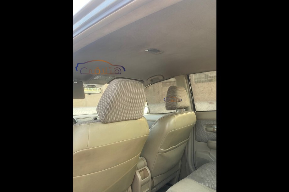 Tiida Nissan رمادي