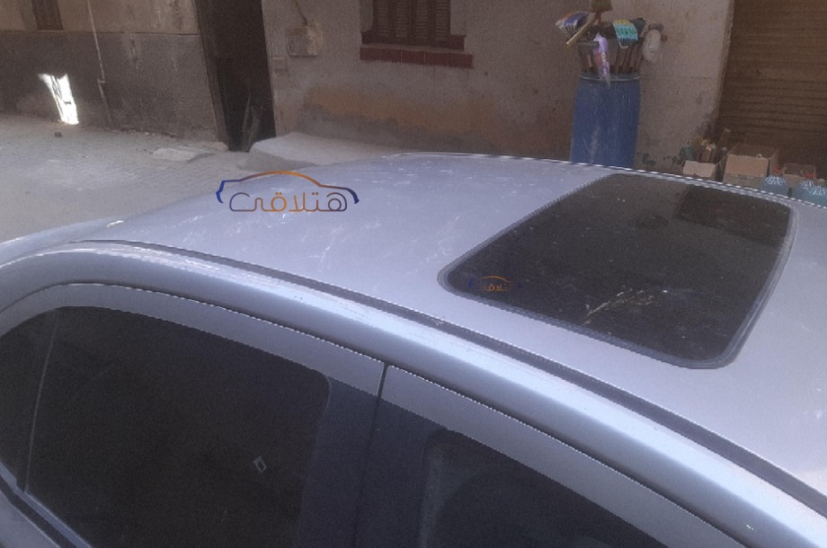 Optra Chevrolet فضي