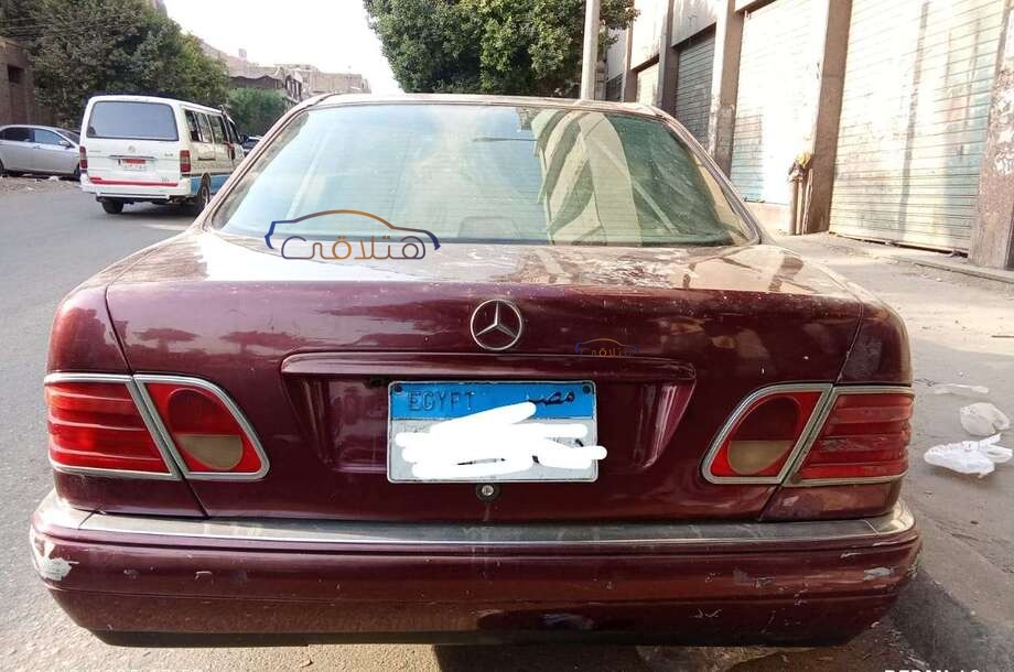 230 Mercedes Dark red
