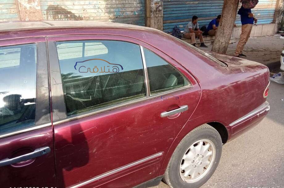 230 Mercedes Dark red