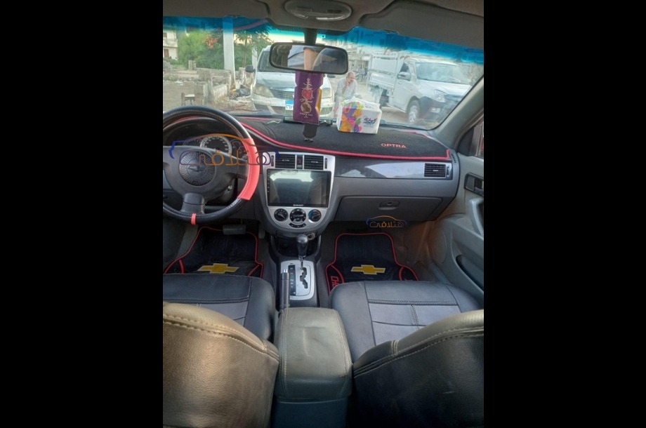 Optra Chevrolet احمر