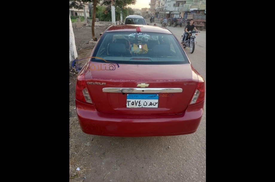 Optra Chevrolet احمر