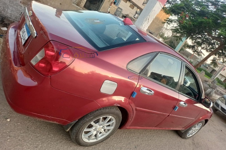 Optra Chevrolet احمر