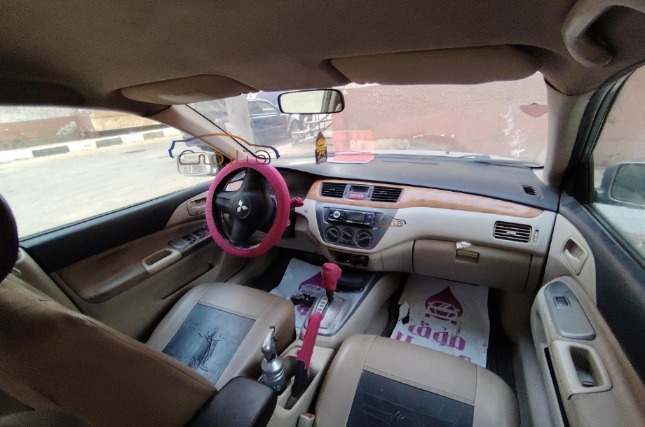 Lancer Puma Mitsubishi فضي