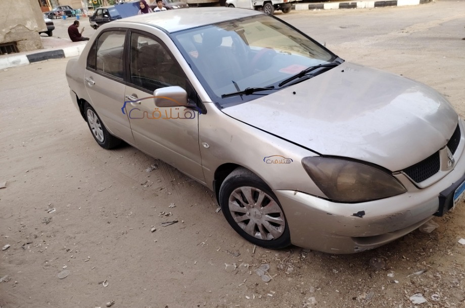 Lancer Puma Mitsubishi فضي