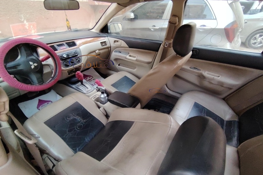 Lancer Puma Mitsubishi فضي