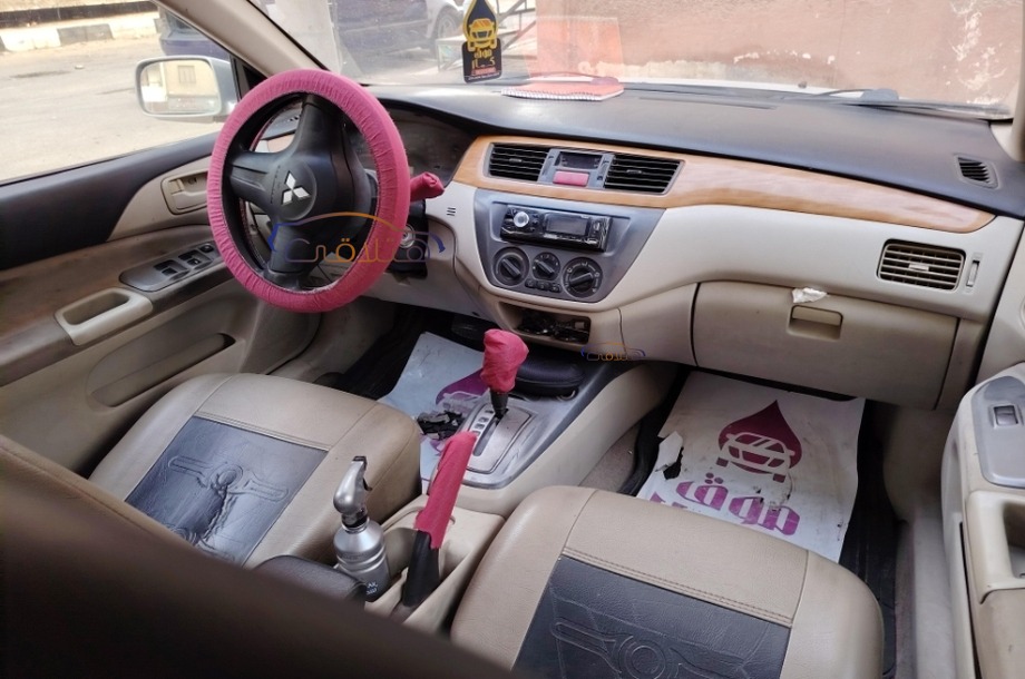 Lancer Puma Mitsubishi فضي