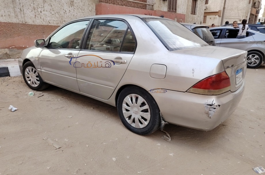 Lancer Puma Mitsubishi فضي