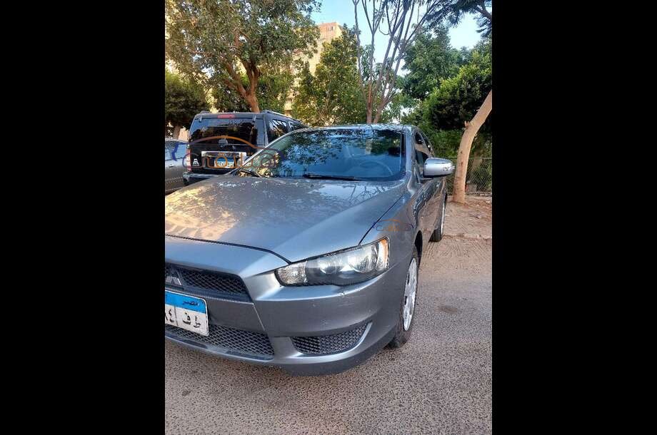 Lancer EX Shark Mitsubishi فضي