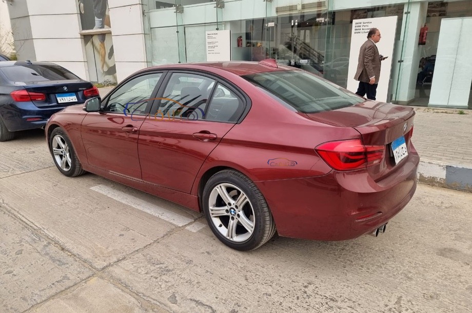 320 BMW Dark red