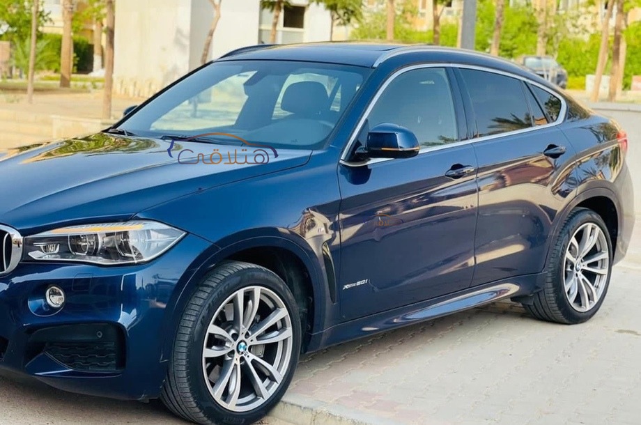 X6 M BMW أزرق