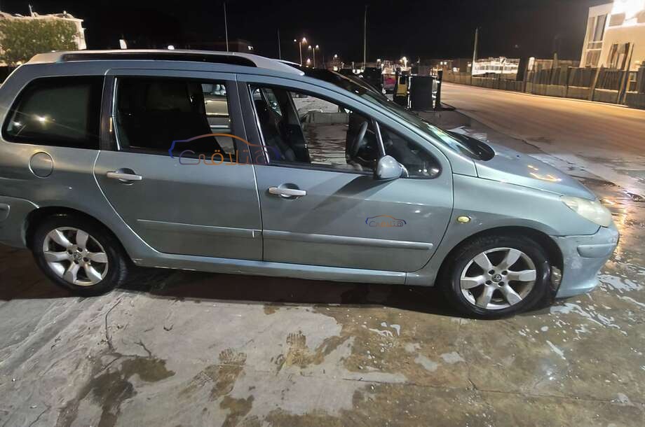 307 Peugeot فضي