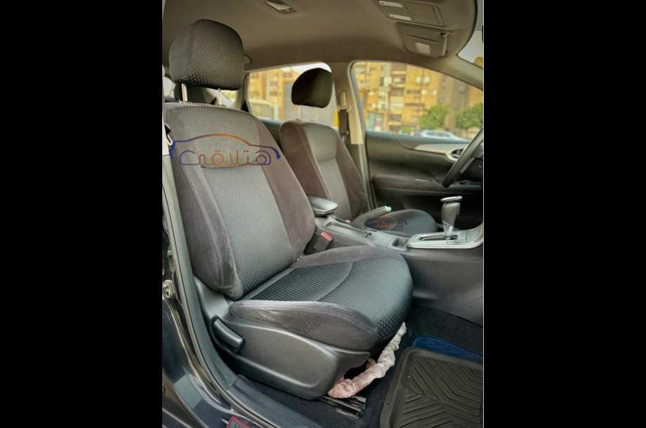 Tiida Nissan أسود