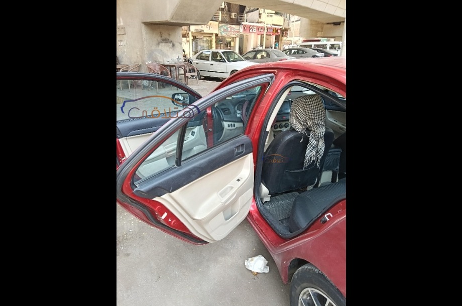 Lancer EX Shark Mitsubishi احمر