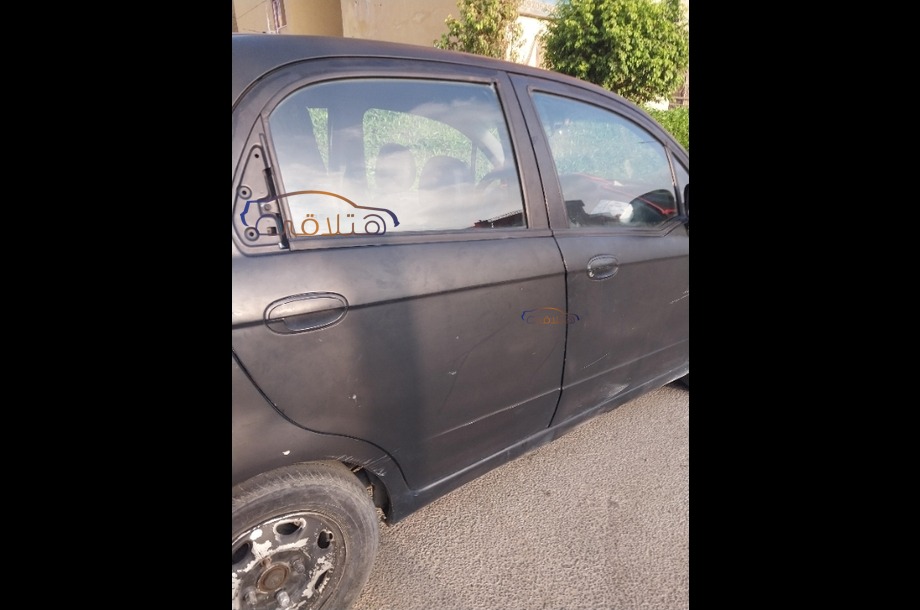 Spark Chevrolet أسود