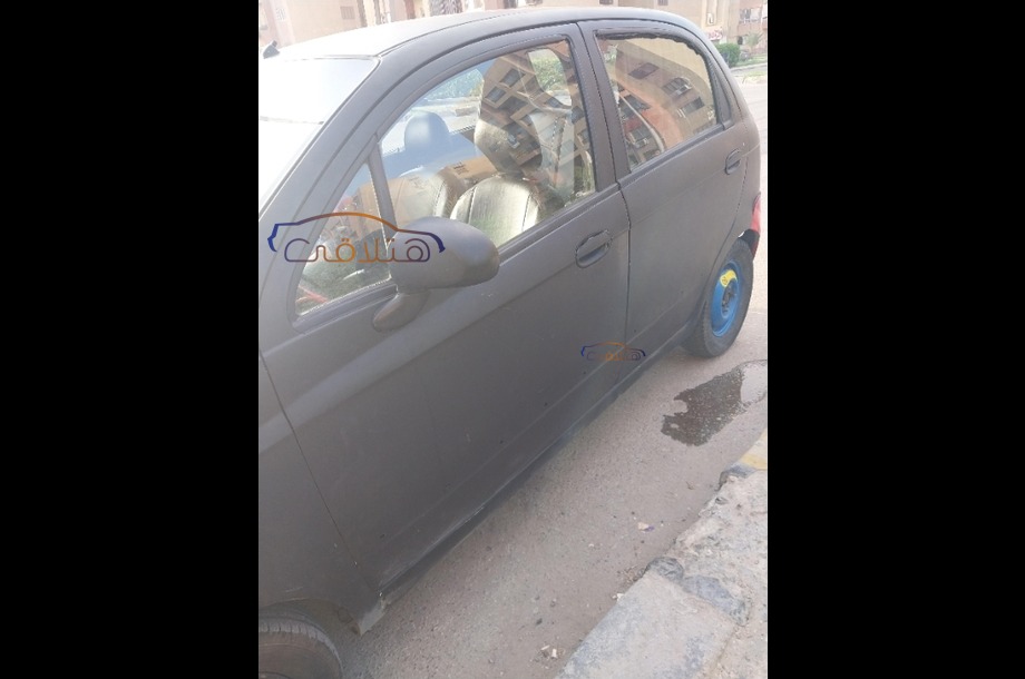 Spark Chevrolet أسود