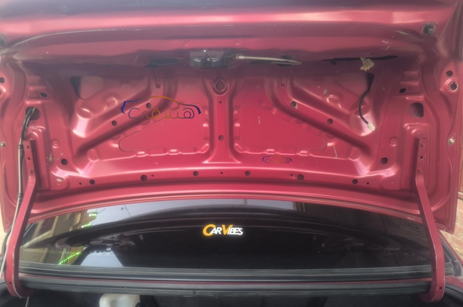 Lancer Puma Mitsubishi احمر غامق