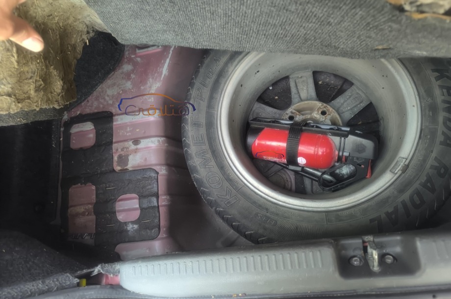 Lancer Puma Mitsubishi احمر غامق