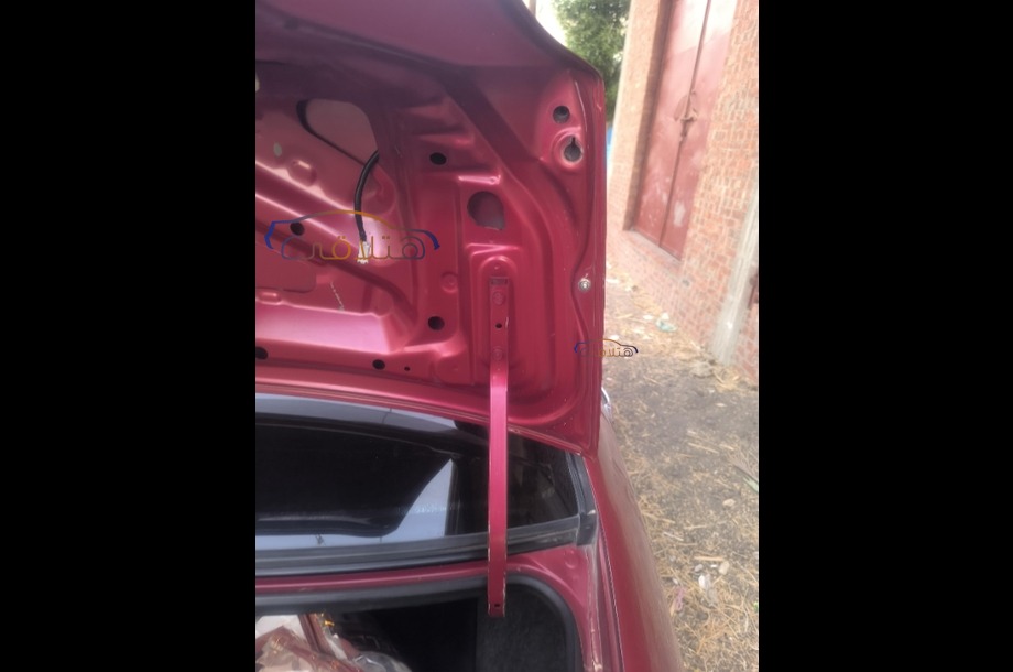 Lancer Puma Mitsubishi احمر غامق