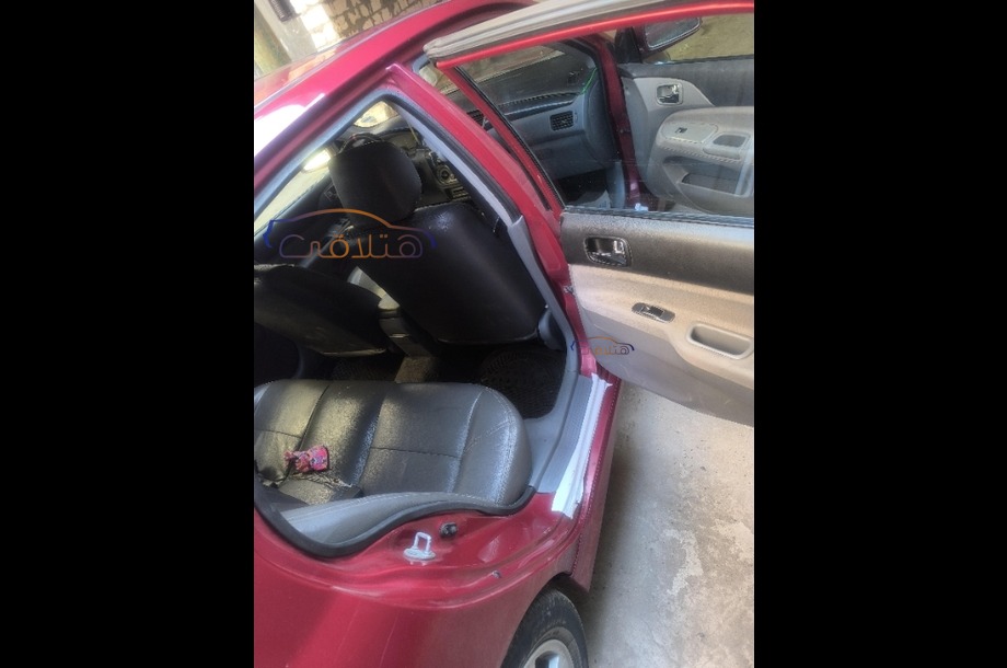 Lancer Puma Mitsubishi احمر غامق