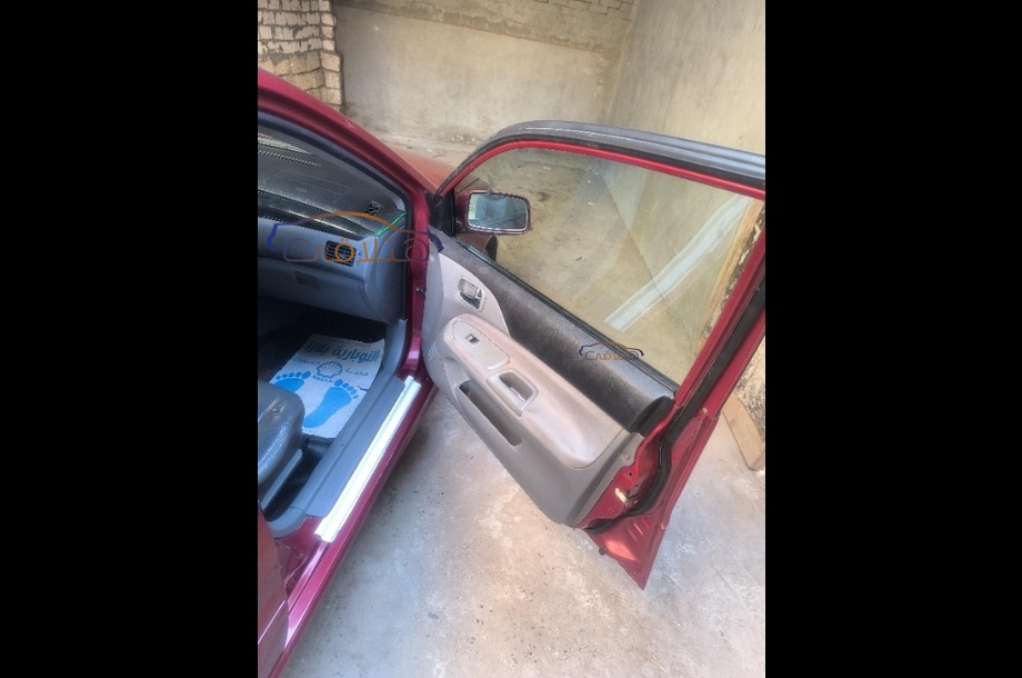 Lancer Puma Mitsubishi احمر غامق