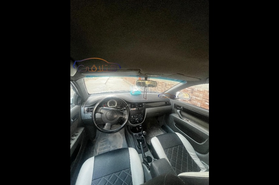 Optra Chevrolet فضي