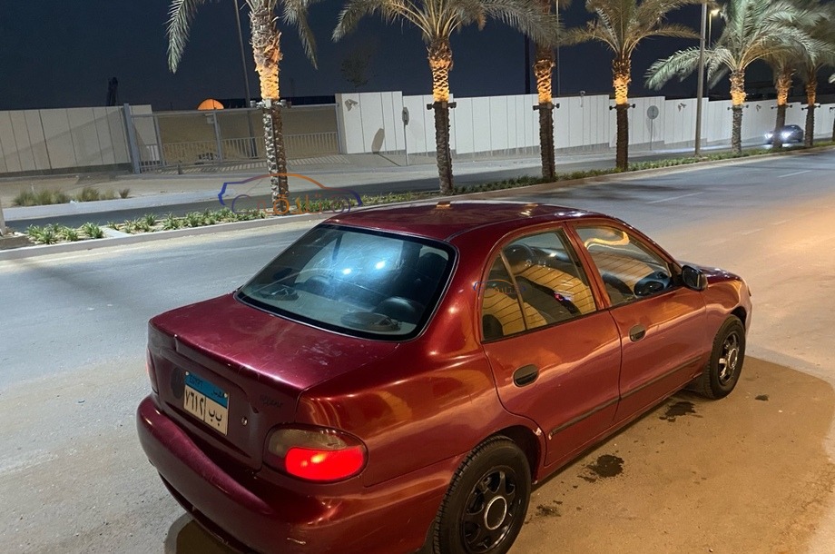 Accent Hyundai Dark red