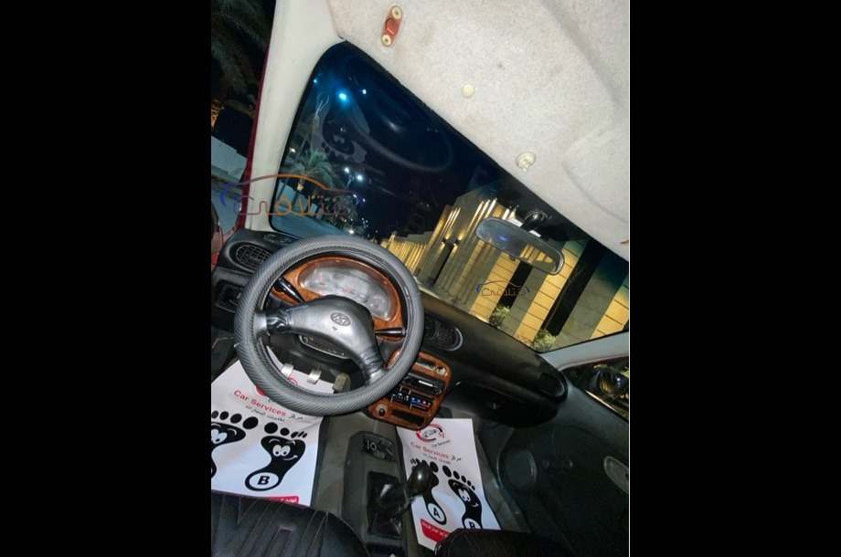 Accent Hyundai Dark red