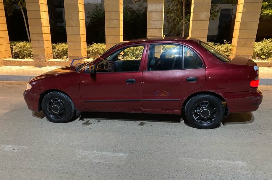 Accent Hyundai Dark red