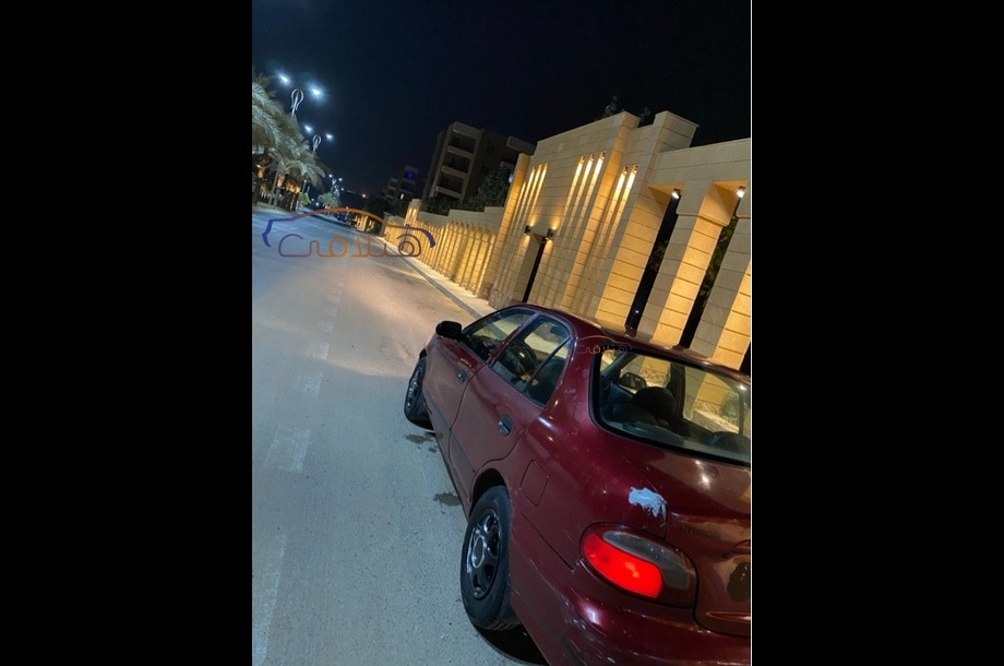 Accent Hyundai Dark red