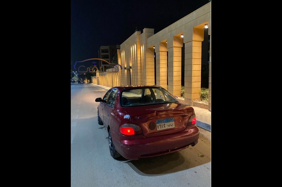 Accent Hyundai Dark red