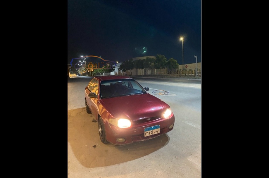 Accent Hyundai Dark red