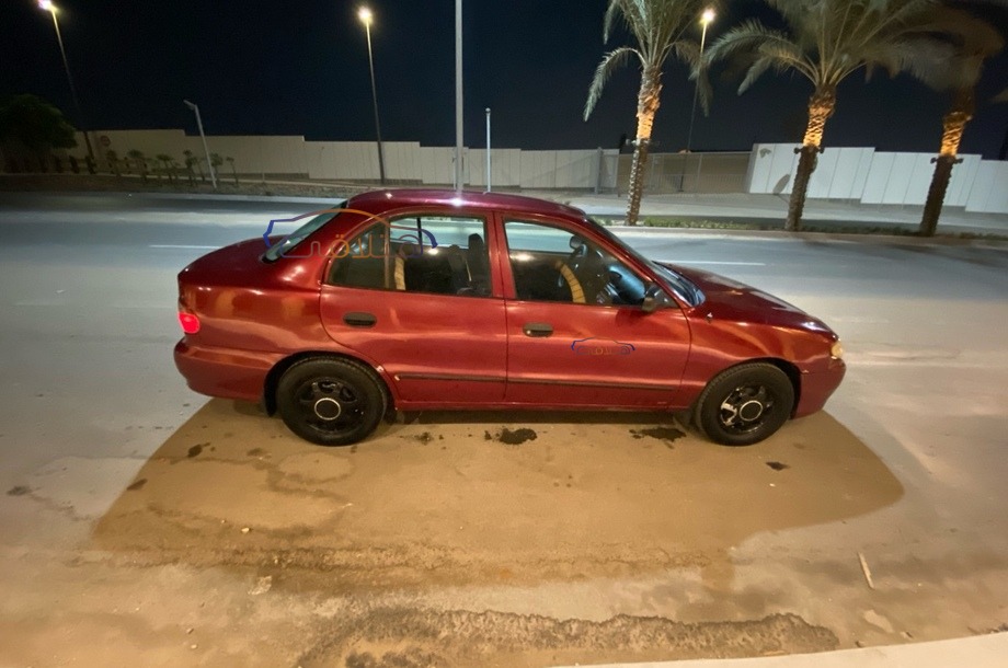 Accent Hyundai Dark red
