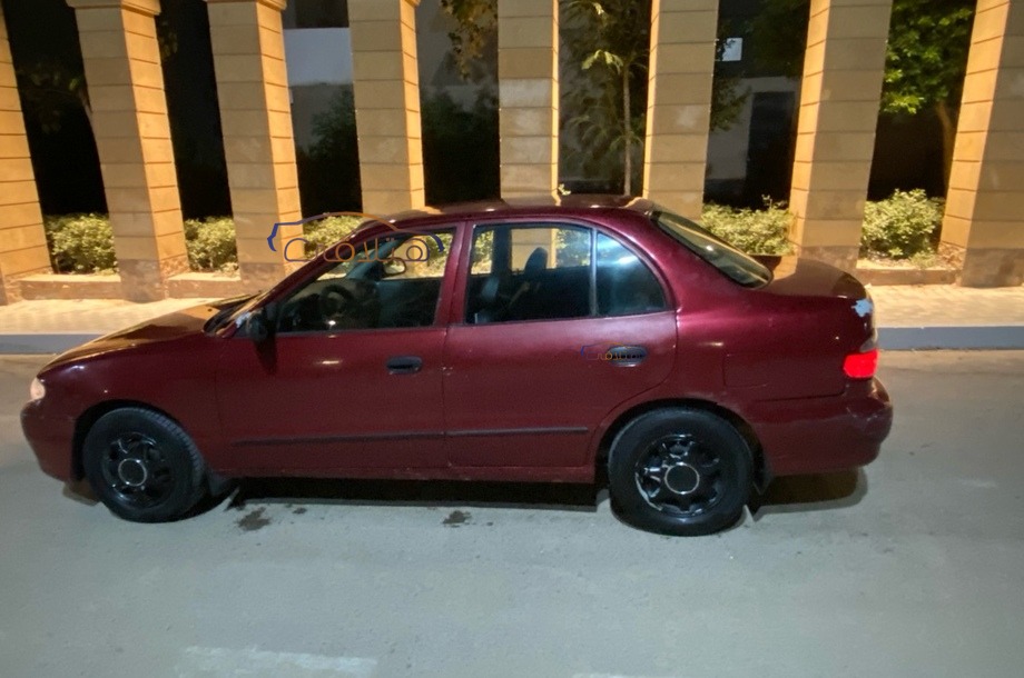 Accent Hyundai Dark red