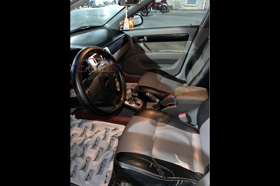 Optra Chevrolet فضي