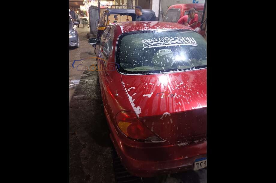 Spectra Kia Dark red