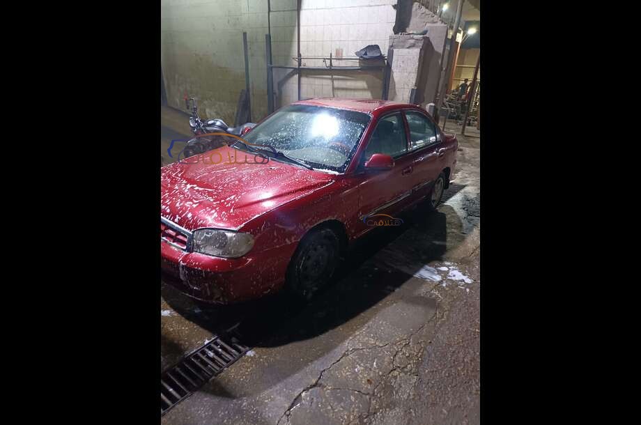 Spectra Kia Dark red