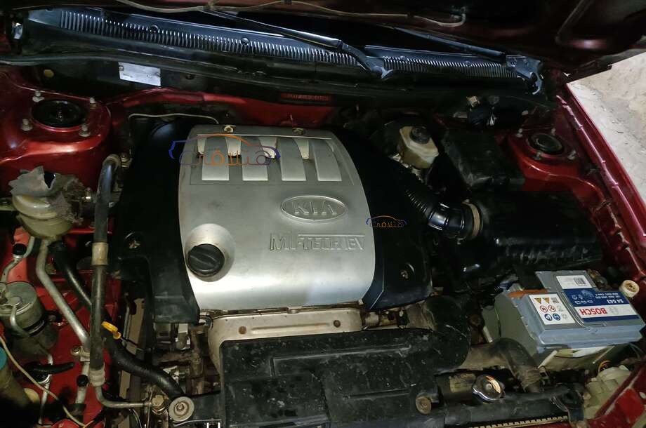 Spectra Kia Dark red