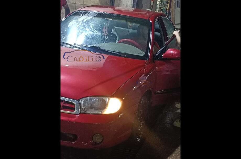 Spectra Kia Dark red